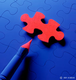 colour photograph of a jigsaw piece coloured red - copyright Jeff Schewe